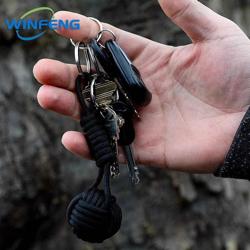 Llavero de puño de mono con cordón de autodefensa para mujer, protección de seguridad al aire libre, bola de acero Personal, arma de supervivencia