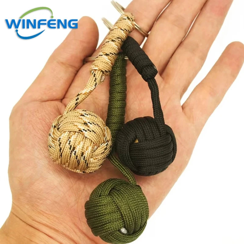 Llavero de puño de mono con cordón de autodefensa para mujer, protección de seguridad al aire libre, bola de acero Personal, arma de supervivencia
