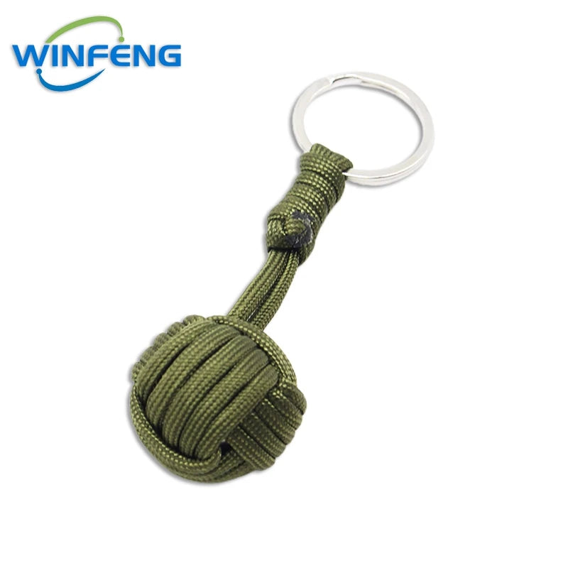 Llavero de puño de mono con cordón de autodefensa para mujer, protección de seguridad al aire libre, bola de acero Personal, arma de supervivencia