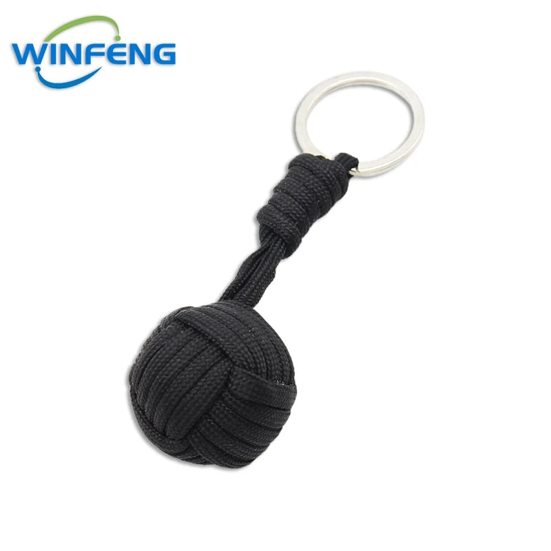 Llavero de puño de mono con cordón de autodefensa para mujer, protección de seguridad al aire libre, bola de acero Personal, arma de supervivencia