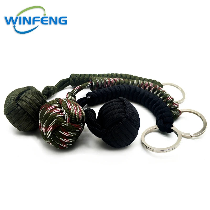 Llavero de puño de mono con cordón de autodefensa para mujer, protección de seguridad al aire libre, bola de acero Personal, arma de supervivencia