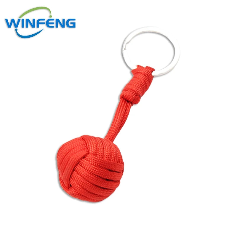 Llavero de puño de mono con cordón de autodefensa para mujer, protección de seguridad al aire libre, bola de acero Personal, arma de supervivencia