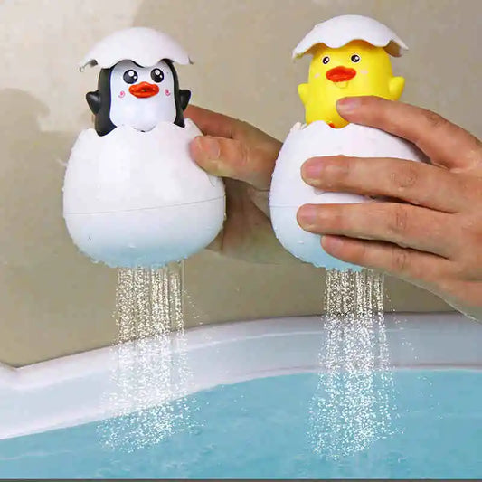 Juguete de Baño para Bebés: Divertido Patito Pingüino con Huevo de Agua - Juguete de Rociador para la Ducha, Piscina y Regalo Infantil