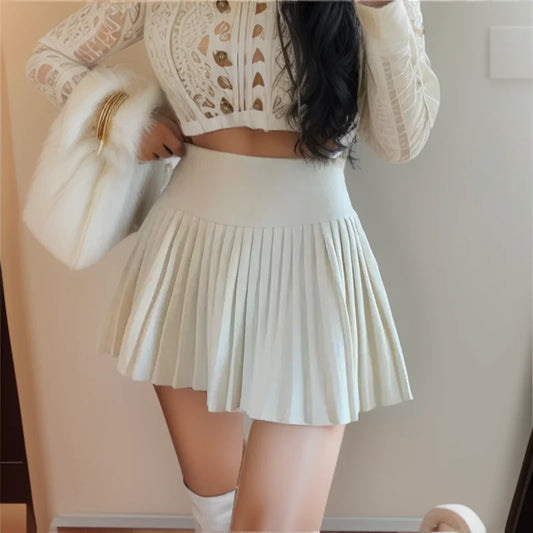 Minifaldas plisadas de cintura alta para mujer, faldas cortas con cremallera lateral, estilo vintage coreano, color blanco y negro