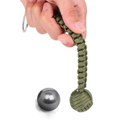 Llavero de puño de mono con cordón de autodefensa para mujer, protección de seguridad al aire libre, bola de acero Personal, arma de supervivencia