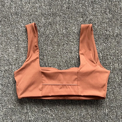 Sujetador Deportivo Unisex de Nailon Estirable con Tirantes Anchos, Dobladillo Curvado, Secado Rápido y Soporte Ligero para Yoga y Pilates