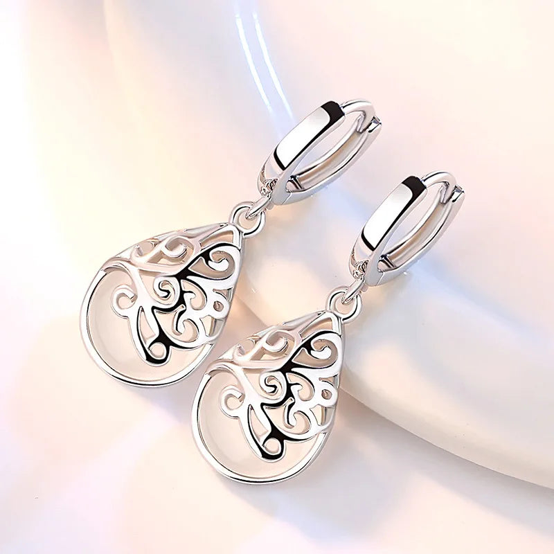Aretes de Mujer de Flor con Piedra Ópalo en Plata de Ley 925 - Joyería Original Antialérgica