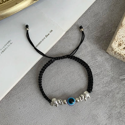 Pulsera de Protección Turca con Ojo de Demonio – Pulsera de la Suerte para Hombre y Mujer, Tejida a Mano en Rojo, Negro y Azul