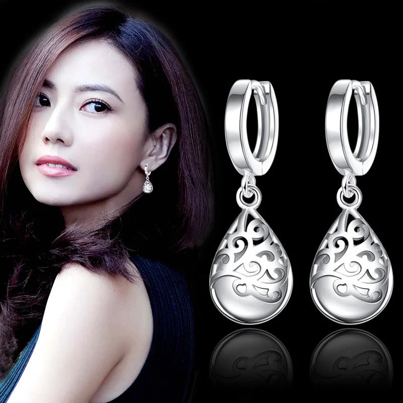 Aretes de Mujer de Flor con Piedra Ópalo en Plata de Ley 925 - Joyería Original Antialérgica