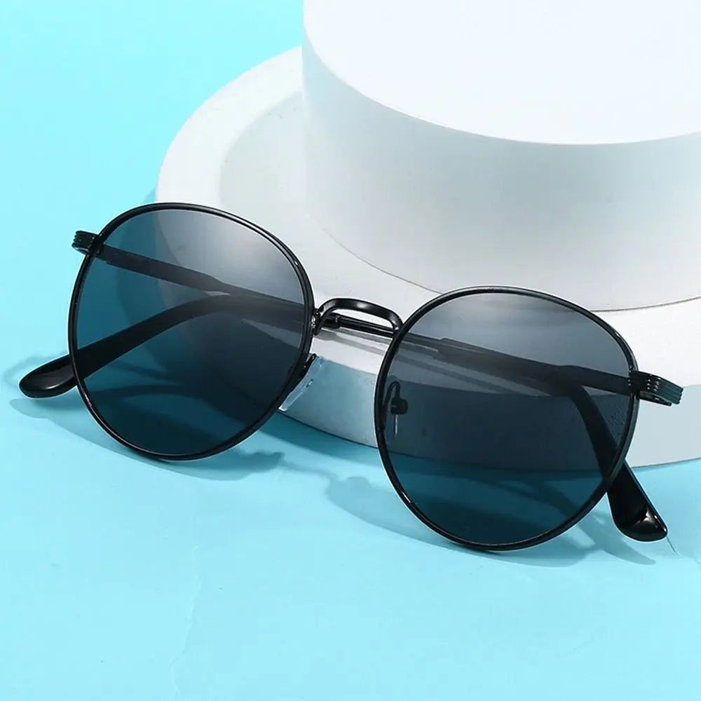 Gafas de Sol Redondas Vintage para Hombre y Mujer - Lentes Circulares con Montura de Metal, Protección UV, Estilo Retro