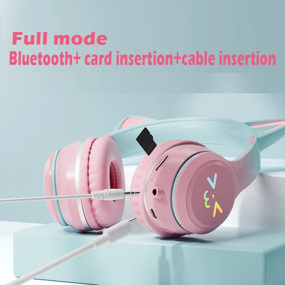Auriculares TWS con Orejas de Gato - Cascos con Luz RGB, Diseño de Cara Sonriente, Gradiente Color Rosa, Compatible con Todos los Teléfonos